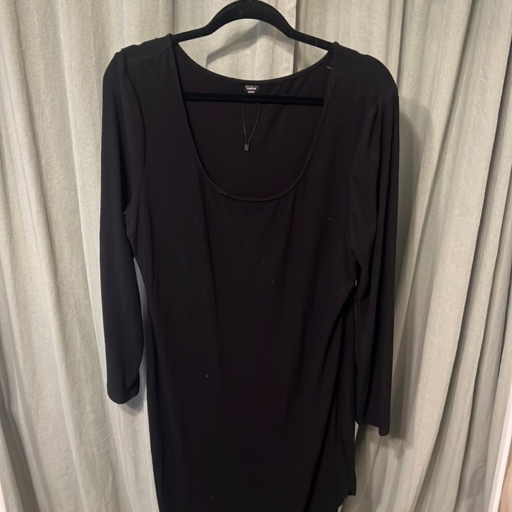 Asymmetrical body con dress